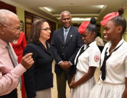 Minister of Labour and Social Security, Hon. Shahine Robinson (second left); Chairman, Jamaica Red Cross 70th Anniversary Committee, Silvera Castro (left); and President, Jamaica Red Cross, Dr. Dennis Edwards (centre), interact with students of Bridgeport High School, Kadian Smith (second right) and Natasha Morrison, during the media launch of the Jamaica Red Cross 70th Anniversary celebration, at The Knutsford Court Hotel in New Kingston on February 16.