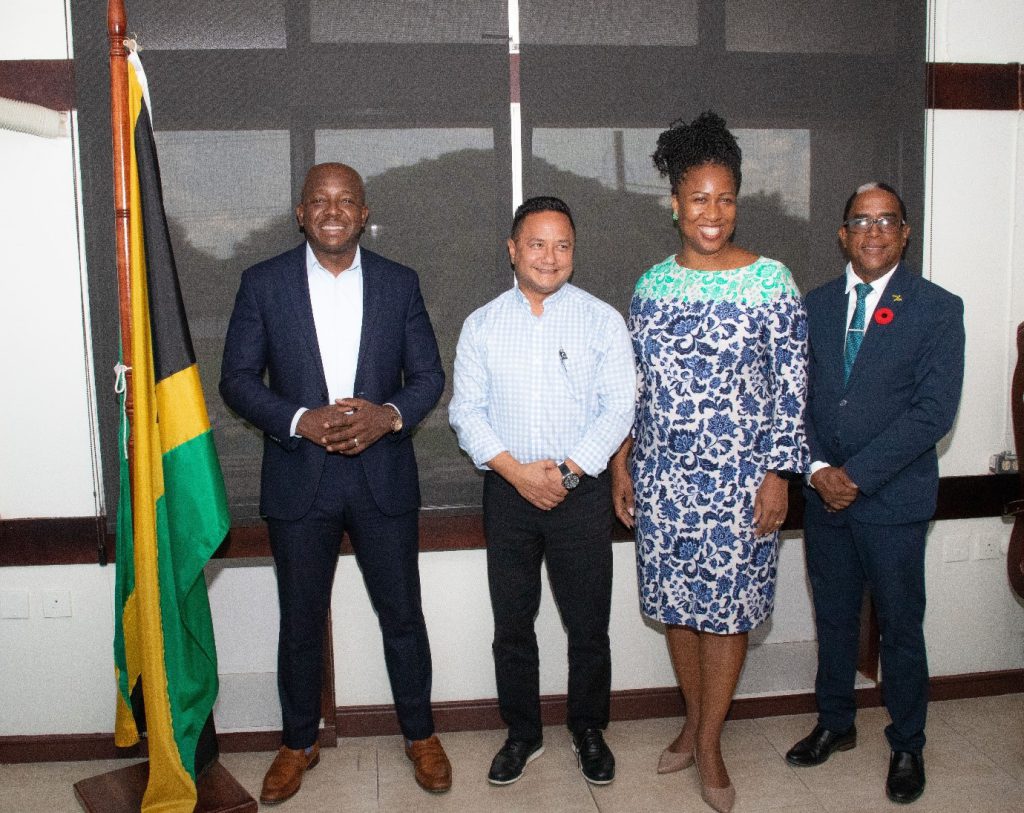 Minister of Labour & Social Security, Hon. Pearnel Charles Jr. poses for a photo opportunity with newly appointed Board Chairman of the Jamaica Productivity Centre, Mr. Omar Azan